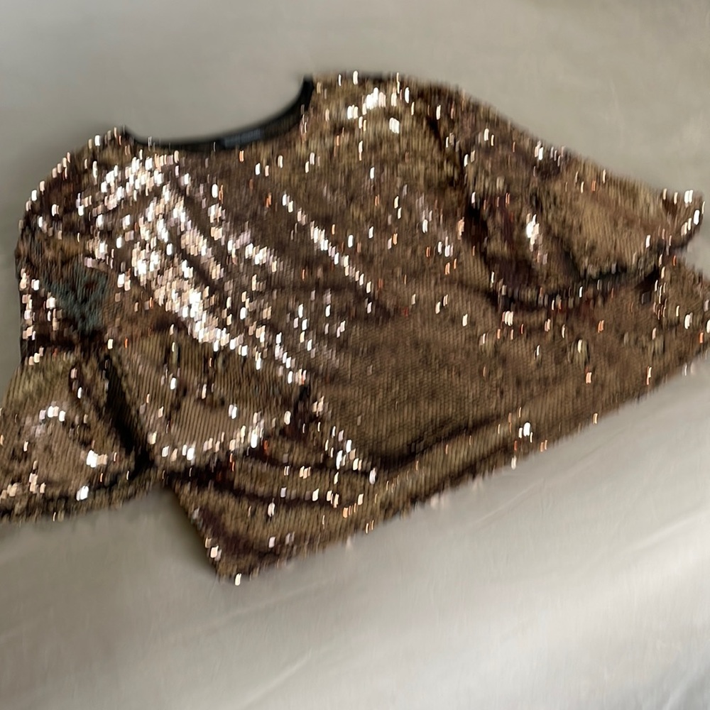 Woman’s sparkly top